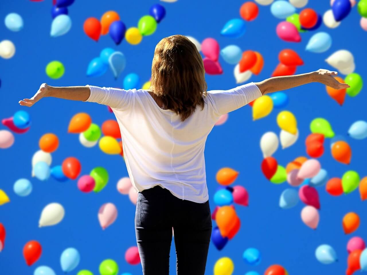Woman look at balloons